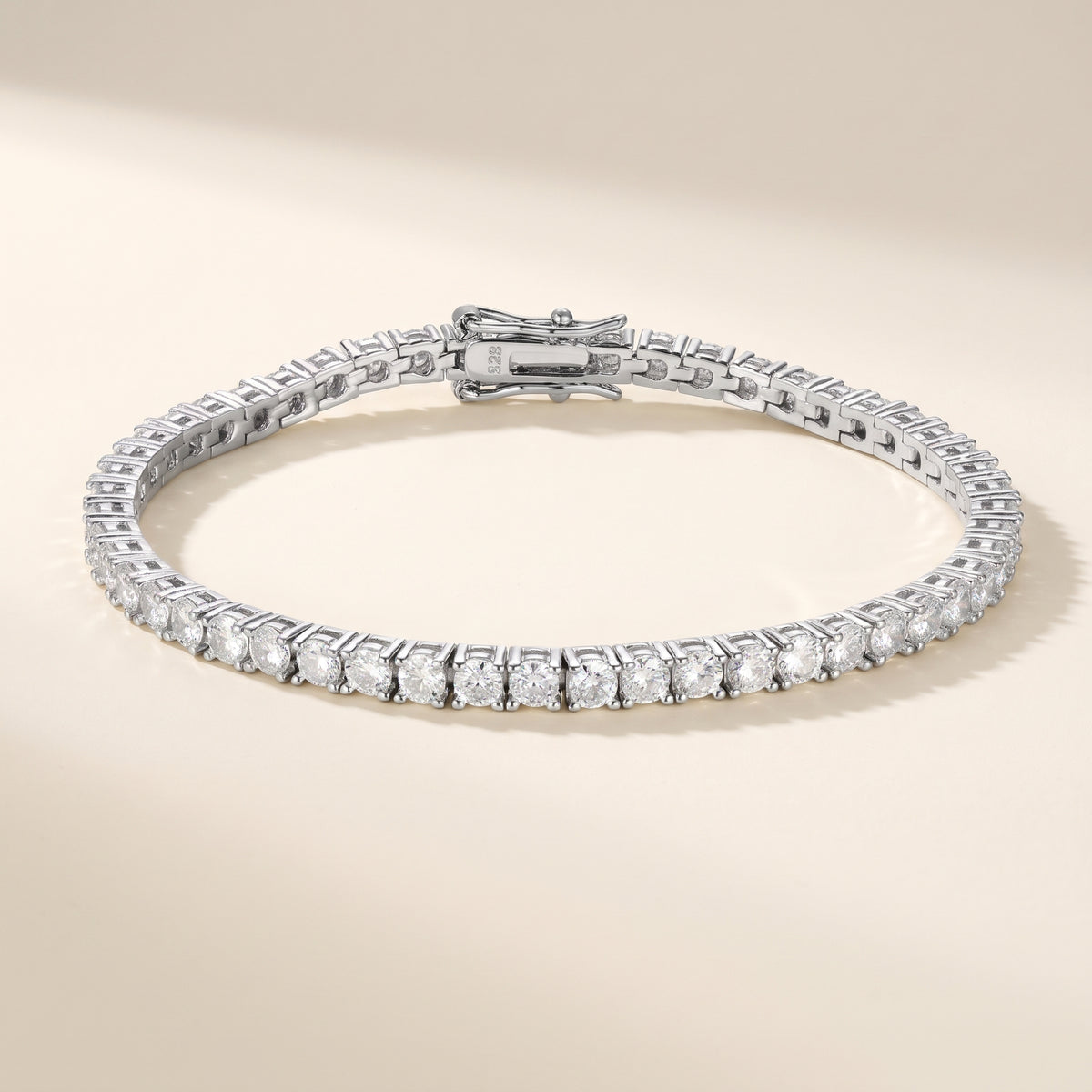 The Starfall Tennis Bracelet in 925 sterling silver with lab-created moissanite, on an ivory background
