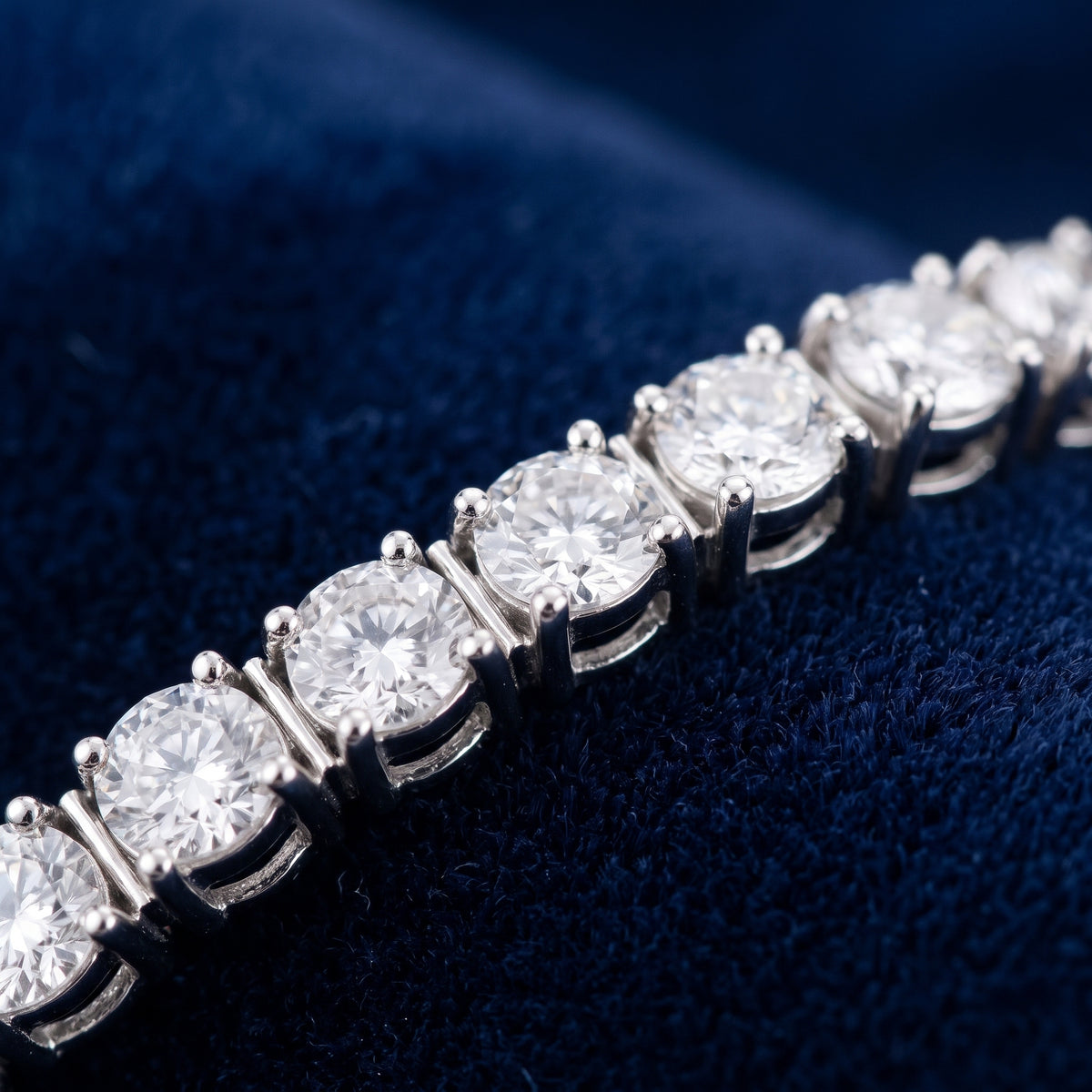 Close-up of the claw-set lab-created moissanite stones of the Starfall tennis bracelet